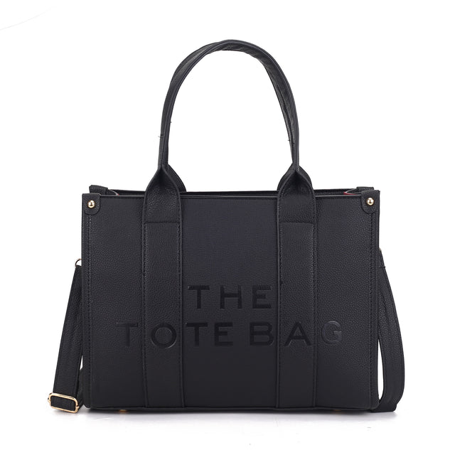 MEDIUM EMBOSSED THE TOTE BAG
