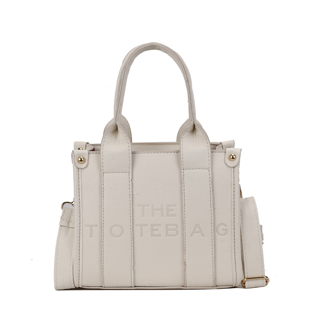 SMALL EMBOSSED THE TOTE BAG