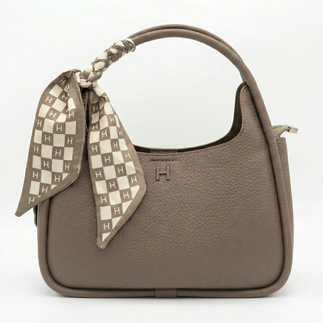 Brown handbag with a matching checkered scarf on a white background