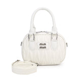 Quilted Barrel Handbag