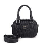 Quilted Barrel Handbag