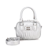 Quilted Barrel Handbag